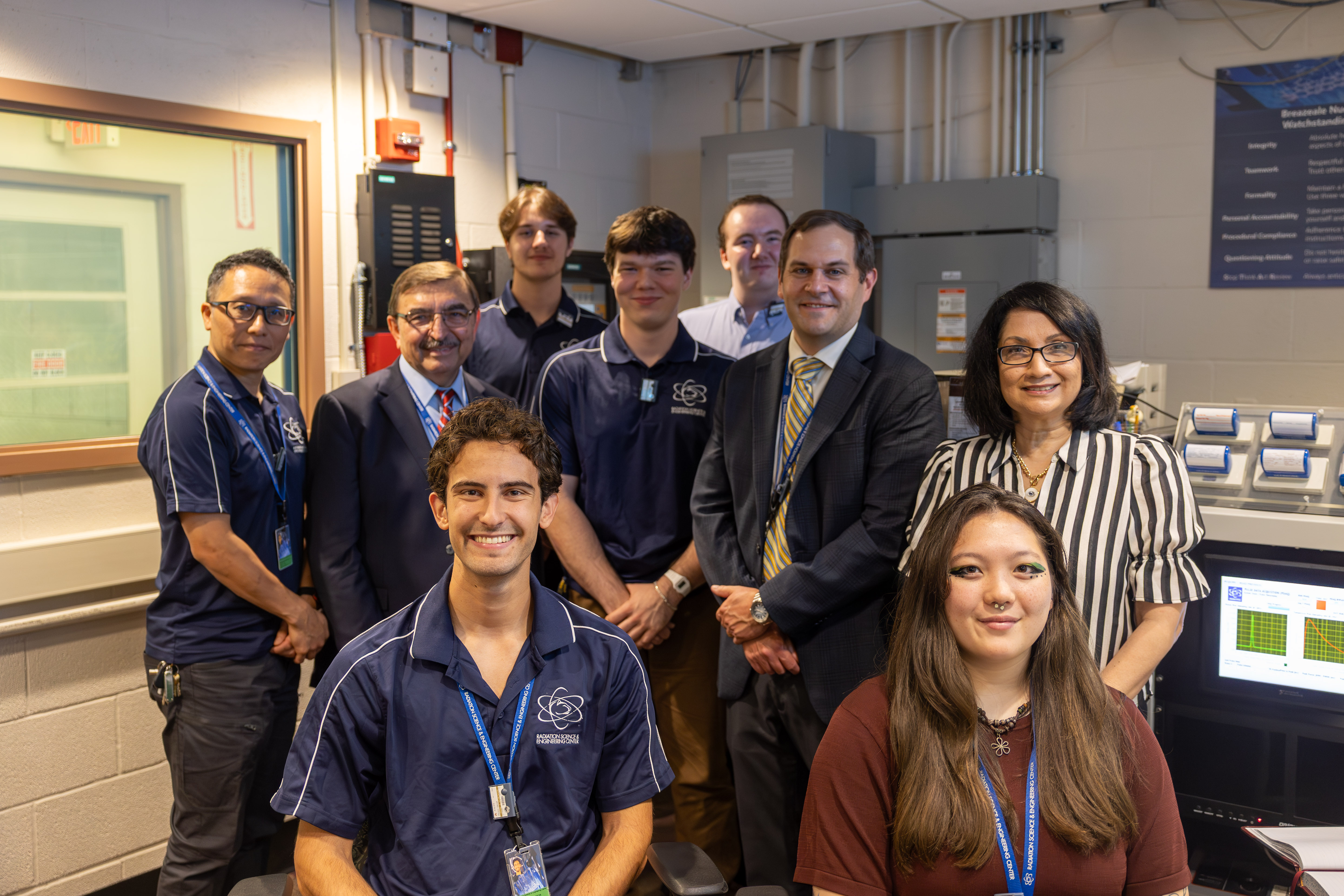 President Bendapudi meets with student operators and reactor staff in the control room. Credit: Kate Kenealy. All Rights Reserved.